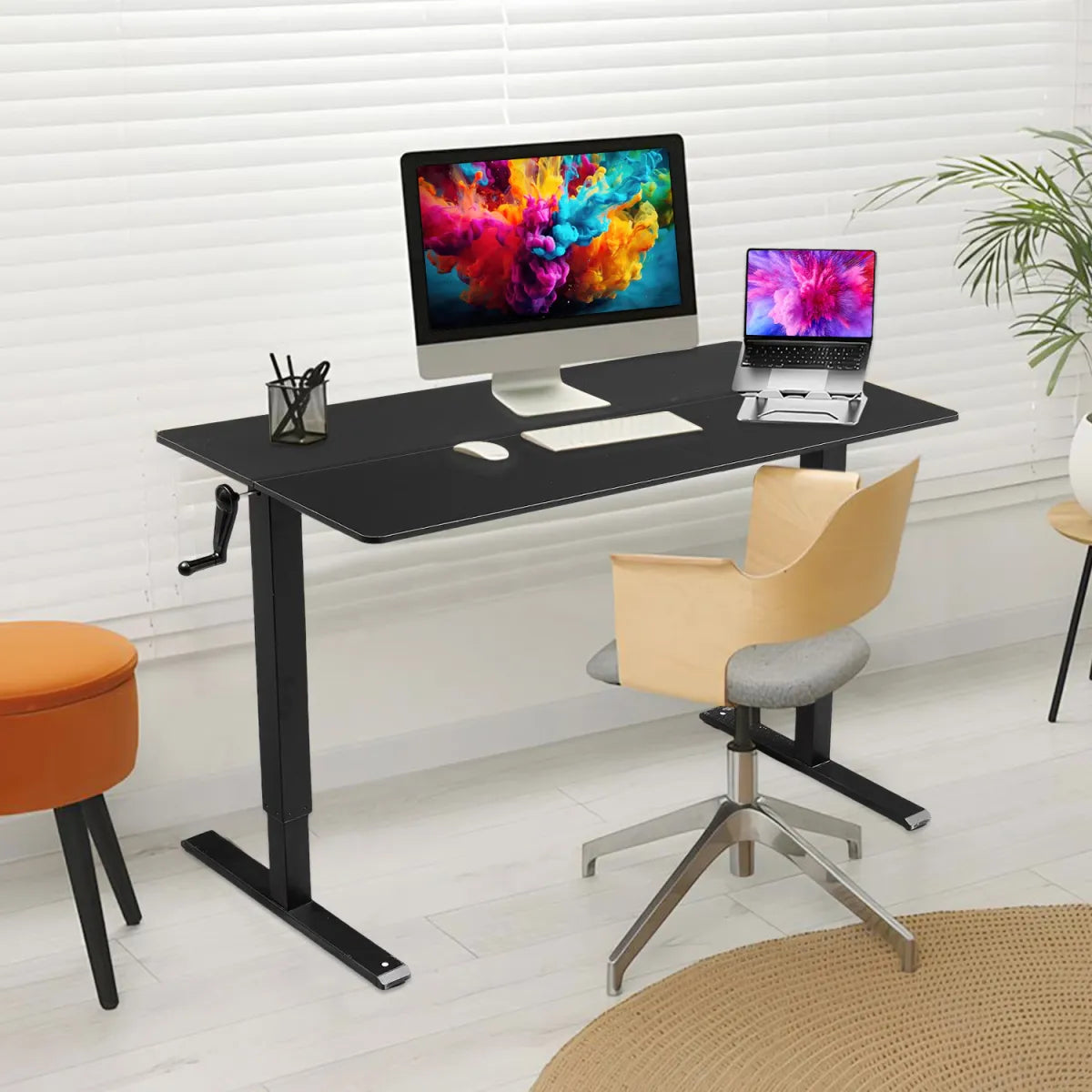 Hand-crank adjustable office desk with computer and laptop, perfect for home, office, or gaming use.